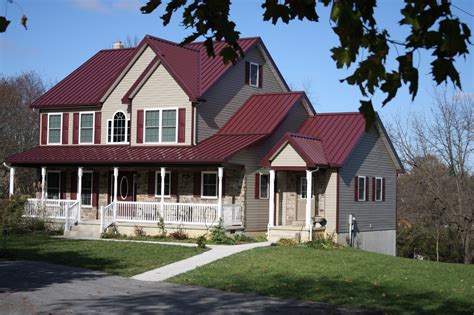 burgundy metal roof on red brick house|dark grey metal roof.